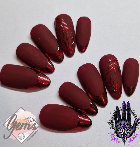 Autumn Dark berry red matte nails with red chrome french tips and leaves