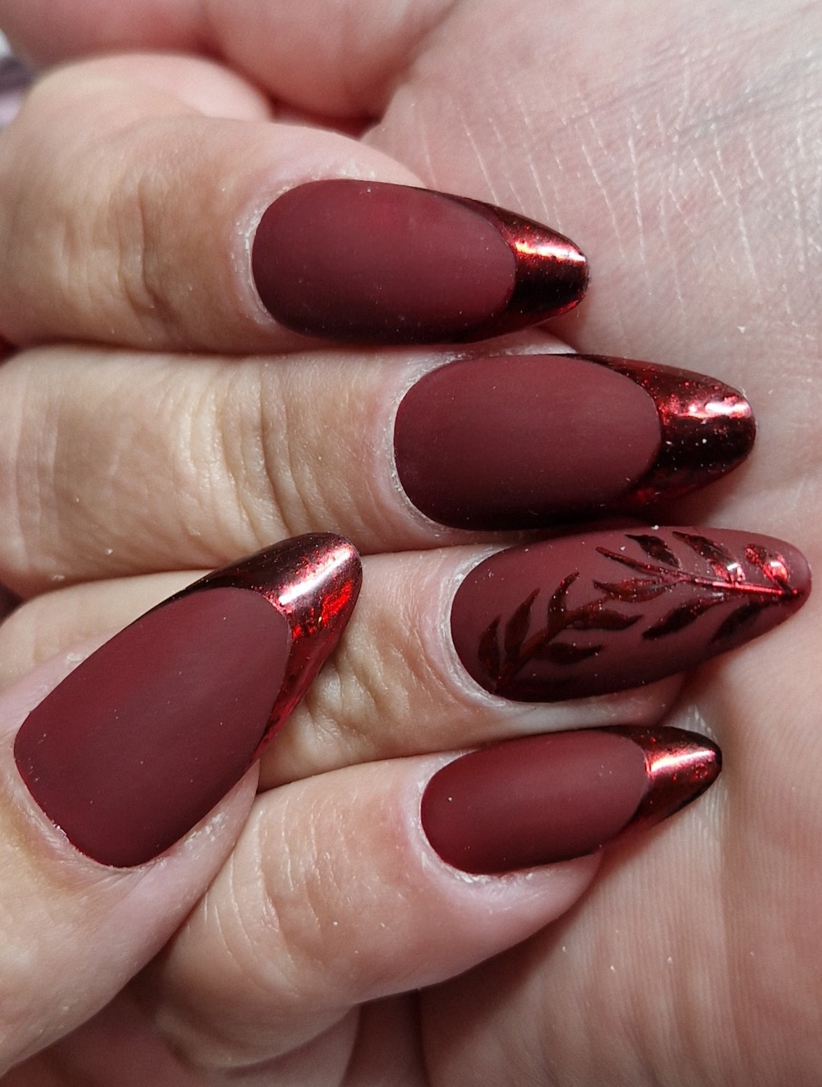 Autumn Dark berry red matte nails with red chrome french tips and leaves
